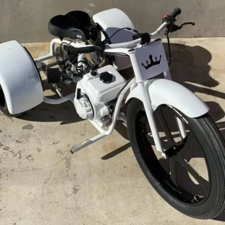 White Knight Mini Trike showcasing its sleek design and powerful engine