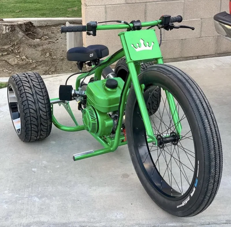 Green Big Wheeler Mini Trike showcasing its powerful engine and sleek design